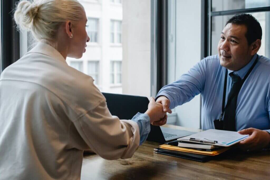 Businessman and businesswomal shaking hands